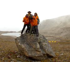 Standing on a boulder above base camp